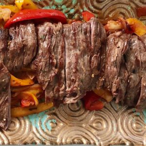 Asian spice Skirt steak with peppers and onions